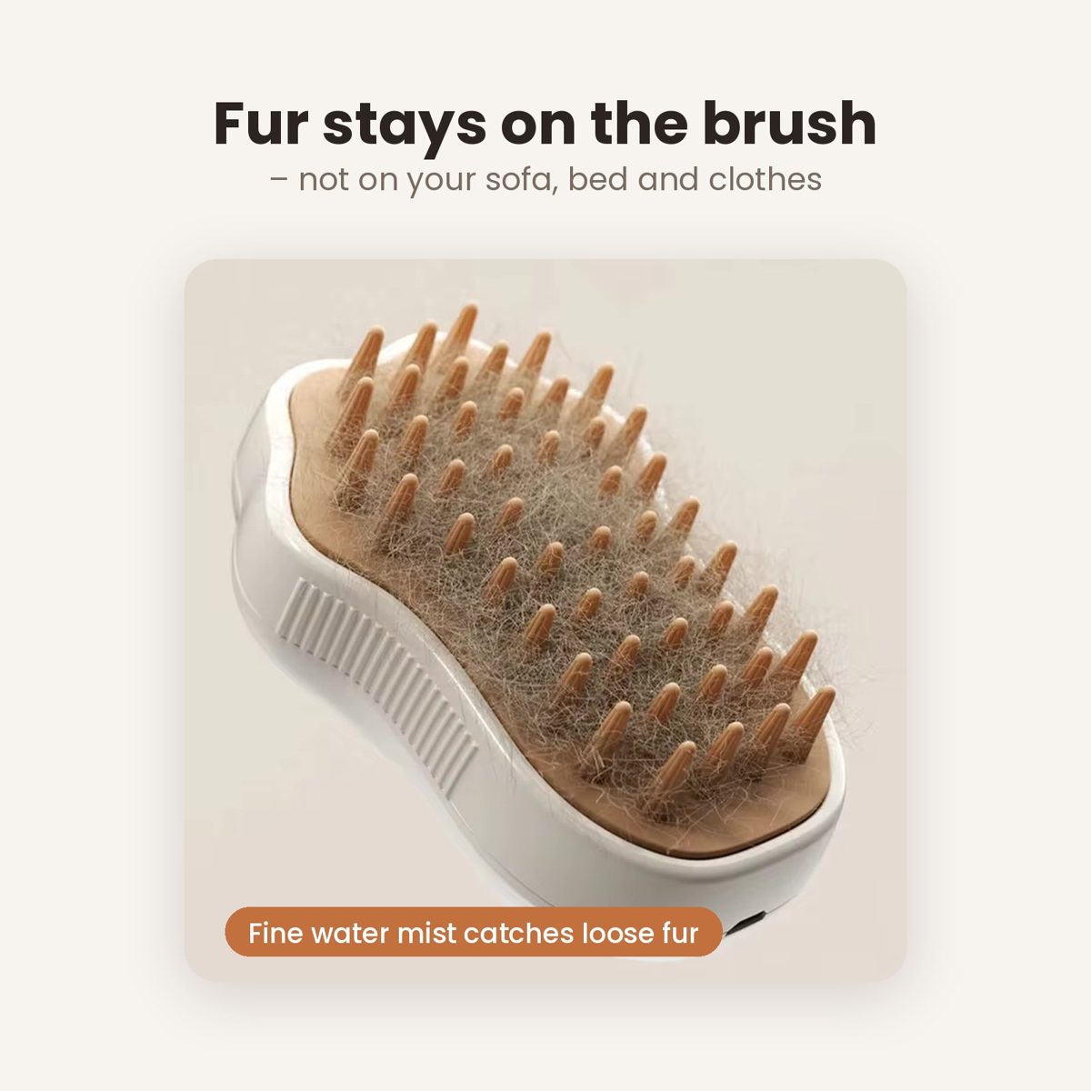 Steam Paw Brush full of loose cat fur – the fine water mist keeps fur on the brush, not on your sofa